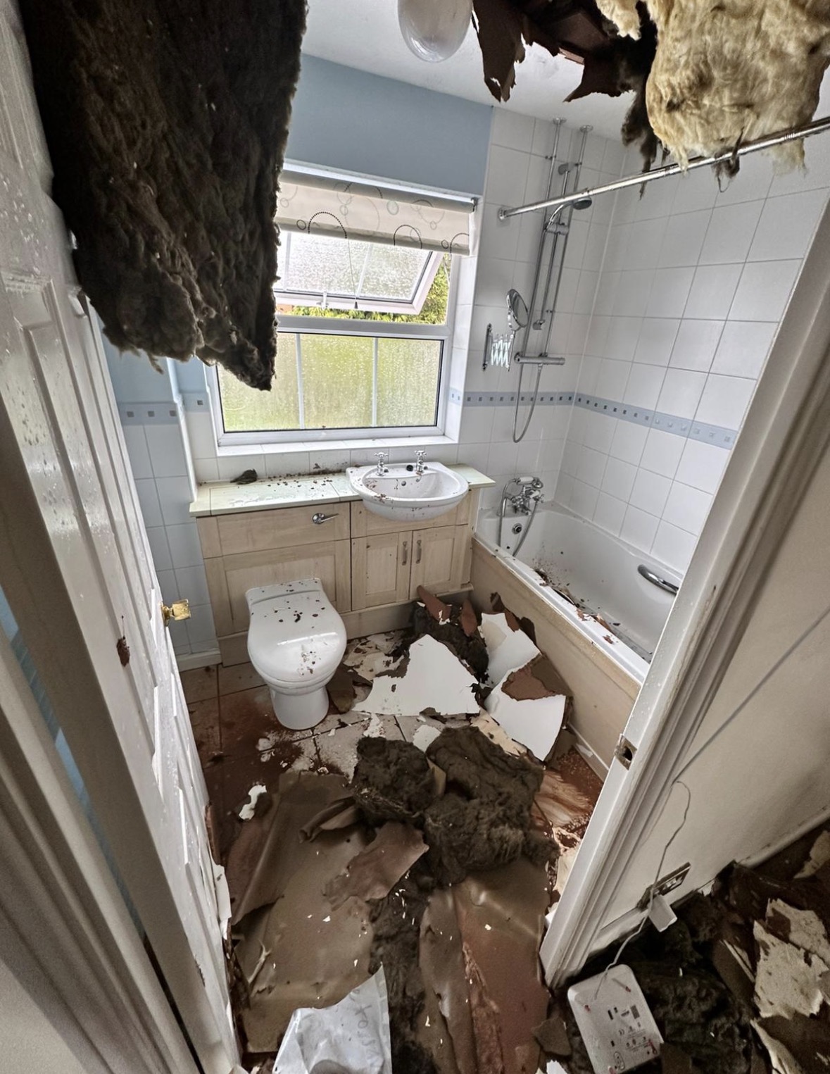 Bathroom ceiling collapsed following an escape of water from above